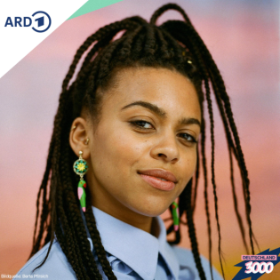 Aminata Belli, wie hast du‘s von der Kirmes vor die Kamera geschafft?